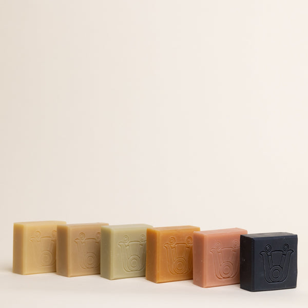 Six mini handcrafted, cold-pressed, organic soap bars by Paca Botanica featured in the discovery kit