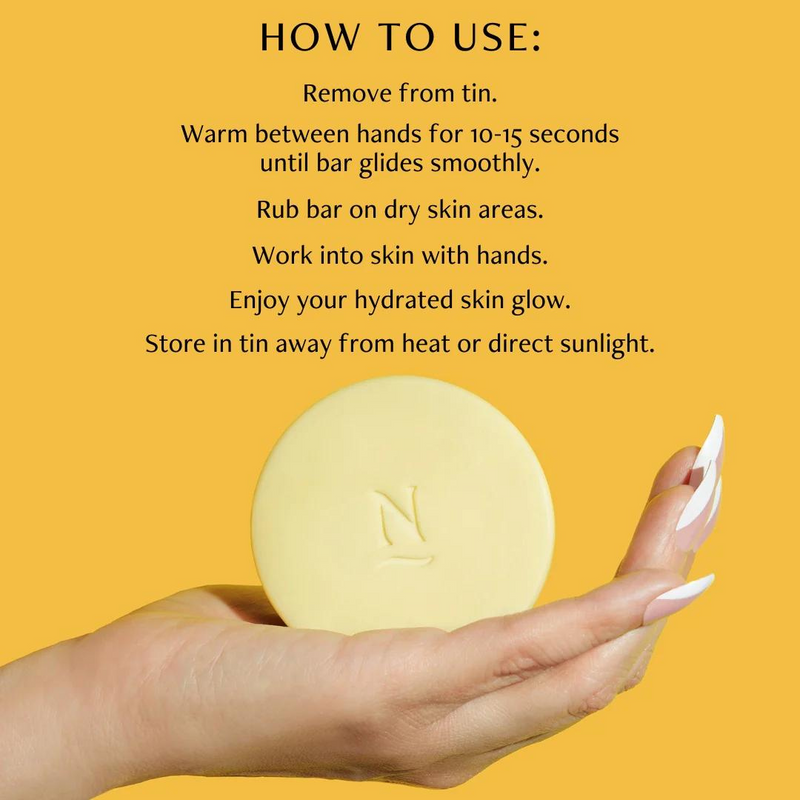 Nopalera Botanical Lotion Bar on a hand with instructions on how to use.