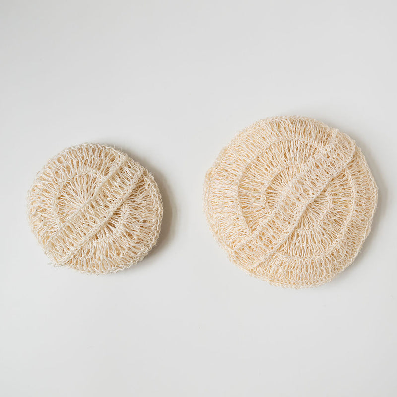 Back side of Large and Regular sized Plastic-free Agave Body Sponges showing the ergonomic handles on a white Background