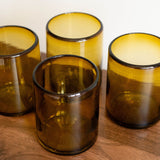 close up of Set of 4 Handblown Recycled Glass Cups - Amber Gold