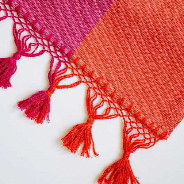 Color Block Pink and Orange Cotton Table Runner with tassels view of tassels