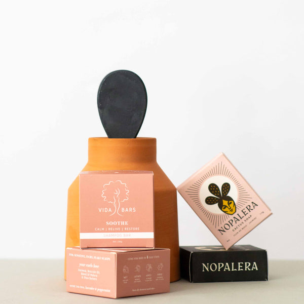 Upgrade your self-care routine with this zero-waste hair and body care bundle, sourced exclusively by Latina-owned brands: Nopalera and Vida Bars. Nourish your body with these clean, natural products, while supporting Latina-owned businesses and cutting your plastic footprint. INCLUDES any two Nopalera Cactus Soaps. Nopalera takes pride in handcrafting each Cactus Soap by infusing it with the powerhouse ingredient: nopal. One Vida Bars shampoo and conditioner set.
