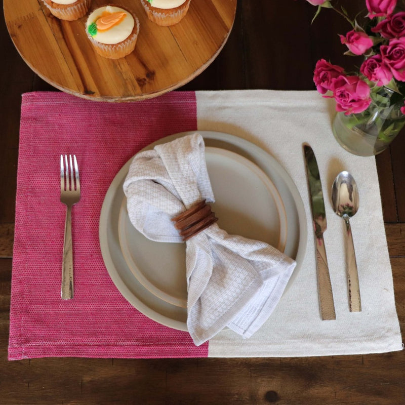 VOLVERde brings you sustainable table linens that celebrate culture and traditions. We curate eco-friendly, sustainable placemats and napkins. These sustainable handwoven placemats made with 100% sustainably sourced with Mexican cotton. Artisanal quality made to last in bright colors like Rosa Mexicano, teal, Azure and Azul. Modern Mexican cotton placemats in rosa mexicano (pink fuchsia). 