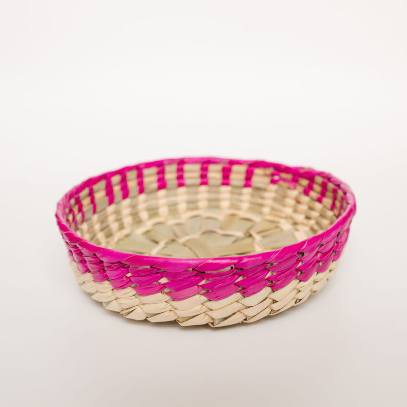 Mexican palm basket with a pink color rim (Rosa Mexicano) and natural bottom