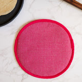 A vibrant Rosa Mexicano pink color block handwoven cotton tortilla warmer, perfect for keeping tortillas warm while adding a pop of color to your table. This eco-friendly, artisan-made kitchen accessory is crafted from sustainable materials, reflecting Mexican cultural heritage and zero-waste values.