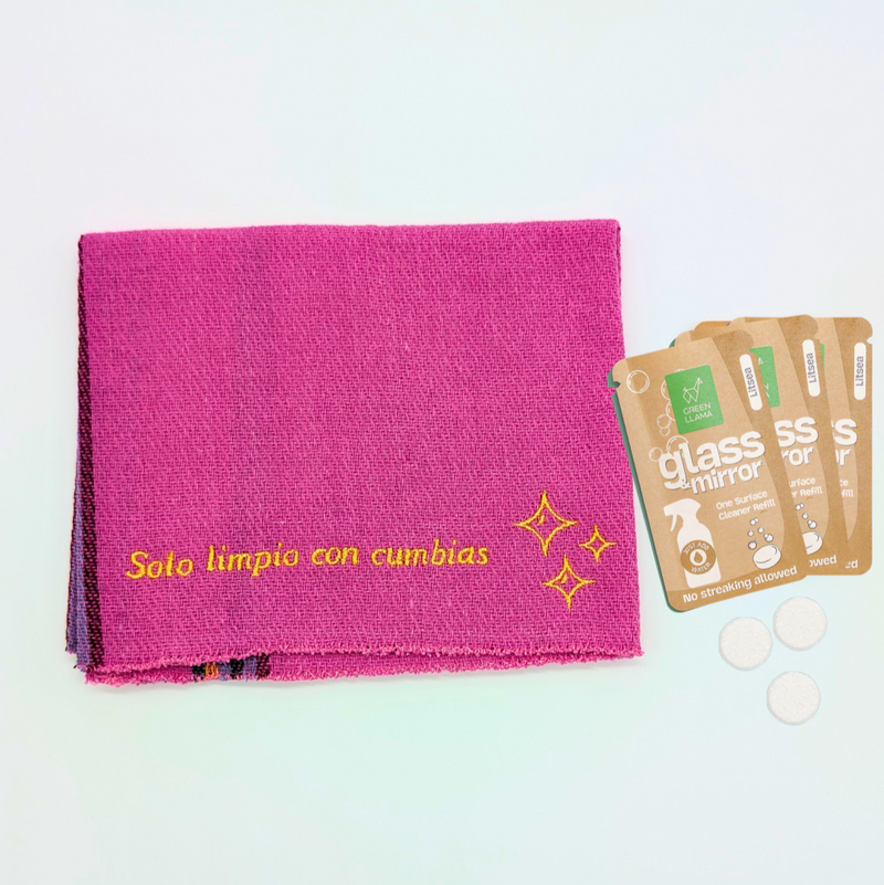 pink jerga cleaning cloth made with recycled cotton and a 3 pack of glass cleaner refills