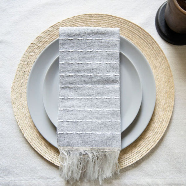 Handwoven by a family of pedal loom weavers in Teotitlán del Valle, Oaxaca using ancestral techniques passed down by generations. These 100% Mexican cotton napkins get softer and more absorbent with every wash. Their modern design makes ditching paper towel waste and opting for this sustainable, zero-waste alternative a no-brainer. Woven to heirloom quality, making the perfect housewarming gift. Bonus: each purchase supports indigenous artisans in Mexico and keeps our ancestral traditions alive.