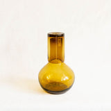 Amber Brown handblown Mexican glass vase on a white background