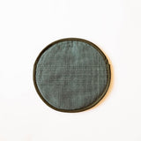 Olive Green Cotton woven cloth tortilla warming pouch on a white surface. 