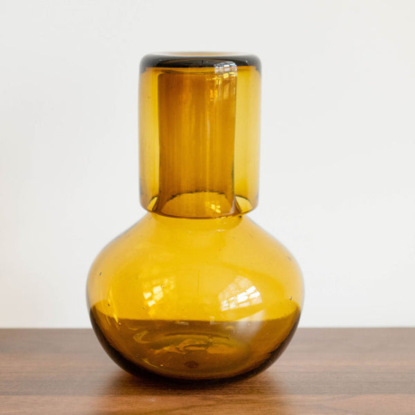 Handblown Glass Carafe with a lid in Ambar Gold. Can also be used as a vase for your beautiful flowers.