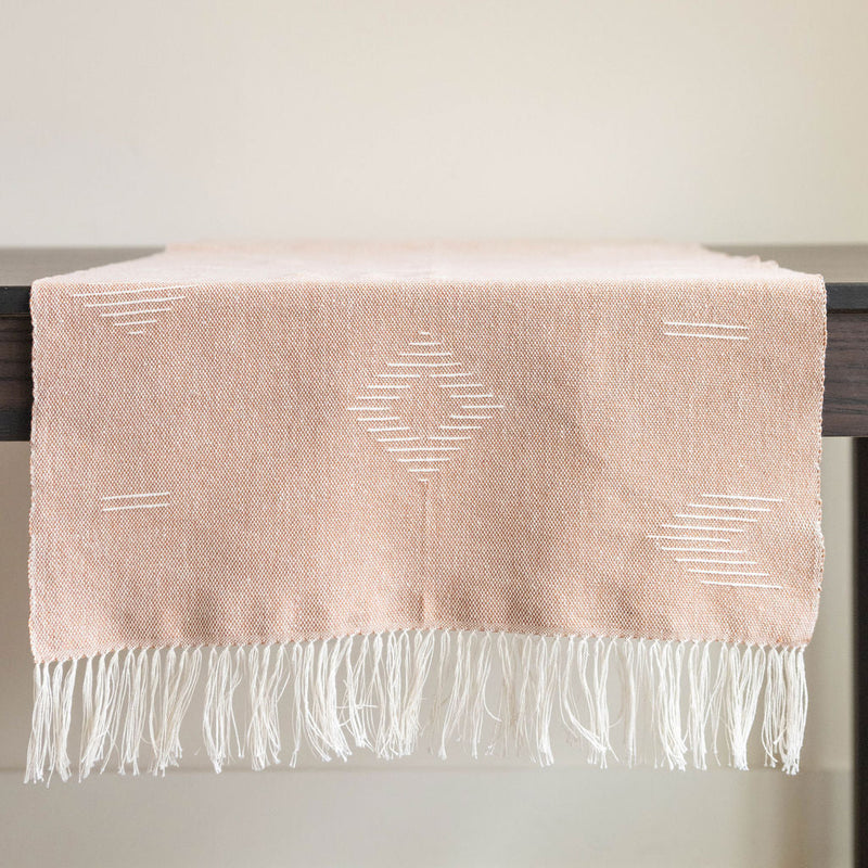 Handwoven Cotton Table Runner with fringe on wood table