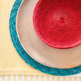 Sustainable green Palm Placemat Round styled on a table.