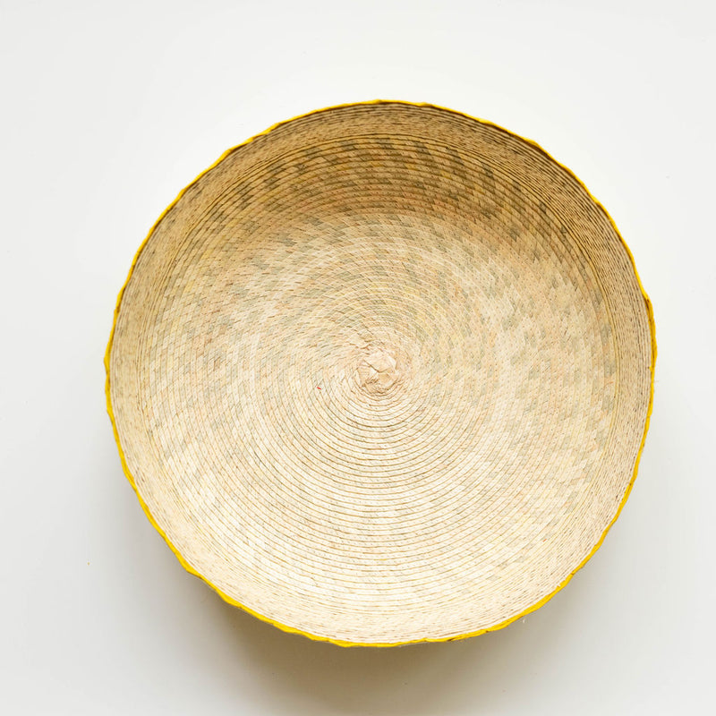 Top view of the round Handwoven Natural Palm Tortilla Warming Basket (tortillero)