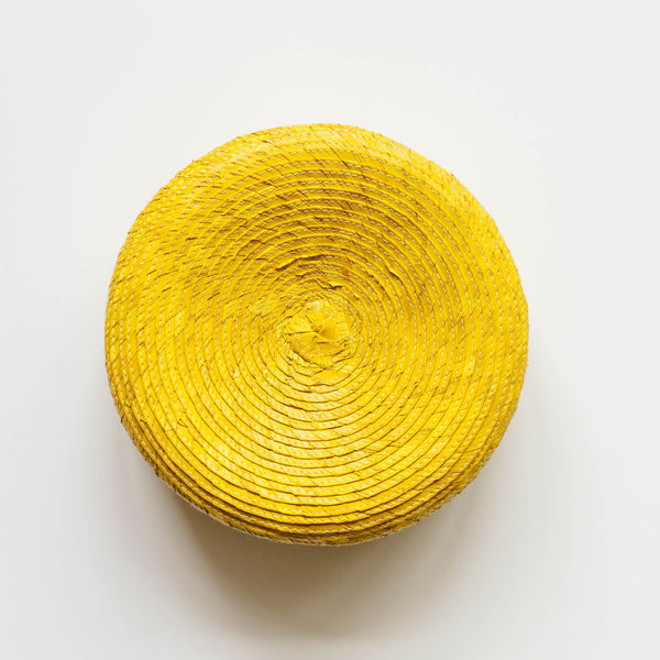 Top view of the round yellow Handwoven Natural Palm Tortilla Warming Basket (tortillero) with Lid 
