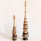 Two handcrafted wooden molinillos hot chocolate frother with custom carved details - a small and large one for comparison