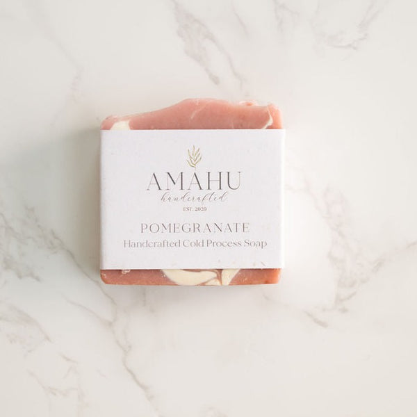ZERO-WASTE, COLD PROCESS SOAP IN POMEGRANATE. Olive, sunflower seed, and coconut oils blend to create Amahu’s nourishing, natural soap bar. This plant-based soap is incredibly moisturizing and hydrating, so your skin feels soft and smooth after use. It's scented with notes of fresh pomegranate to brighten your day and enliven your senses.