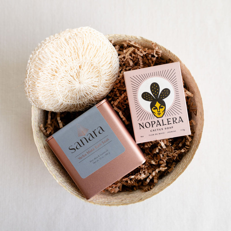La Dama Gift Basket. The Dama Gift Basket includes luxurious, low-waste bath and body products from Latina-owned businesses, including Nopalera, Sanara and Agave Body Sponge. Exclusvely available at VOLVERde. Includes a Nopalera Cactus Soap Bar, Sanara Skincare Bath Soak and a compostable Agave Body Sponge. Beautifully packaged in an artisanal, handwoven palm basket. Gift basket is handwoven by master artisans. We highly encourage you to re-use the basket. Compostable at the end of life.
