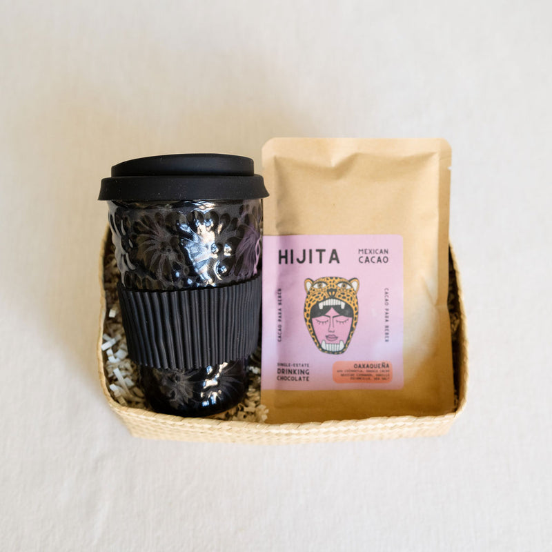 Talavera Tumbler + Oaxacan Drinking Chocolate Tablet Gift Basket – handcrafted ceramic tumbler in black with intricate Talavera design paired with rich, authentic Oaxacan chocolate tablet for a unique Mexican gift set. Perfect for chocolate lovers and fans of artisanal Mexican crafts.