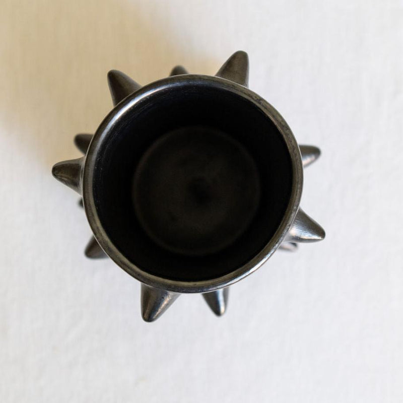 Handcrafted Spiked Black Clay Cups made from authentic Mexican black clay (barro negro), featuring a bold spiked design with a smooth black metallic finish. Perfect for modern drinkware or as a unique artisanal decor piece.