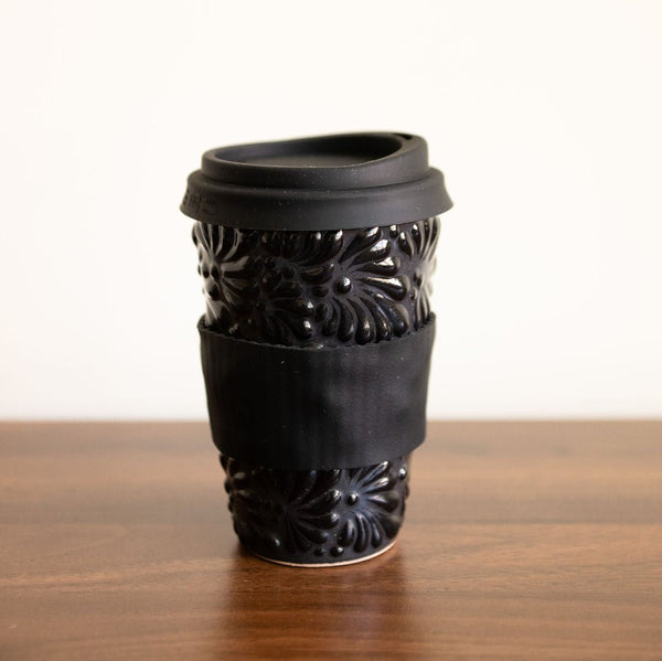 Black Talavera Ceramic Coffee Tumbler with black grip sleeve and black silicone lid.  Intricate, traditional Mexican designs in bold, fade-resistant colors.