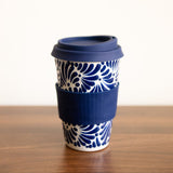 Blue Talavera Ceramic Coffee Tumbler with navy blue sleeve and silicone lid. Featuring intricate, traditional Mexican designs in bold, fade-resistant colors.