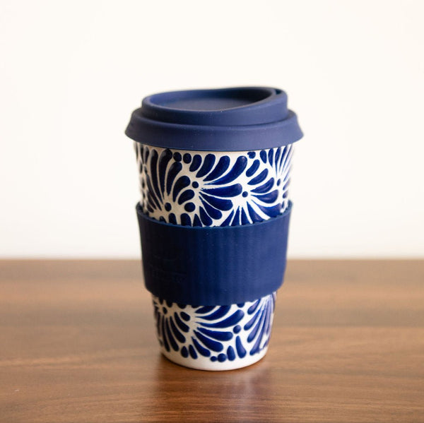 Blue Talavera Ceramic Coffee Tumbler with navy blue sleeve and silicone lid. Featuring intricate, traditional Mexican designs in bold, fade-resistant colors.