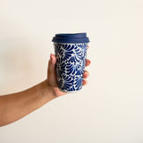 Navy Blue Ceramic Talavera Tumbler with Navy blue lid held by hand