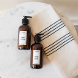 This is a trio of sustainable everyday essentials, ethically made using premium ingredients. Includes a woven hand towel made by expert weavers in small batches, coupled with spa-quality hand soap and body lotion made using herbs grown on an organic family farm. This is the perfect touch for your bathroom or kitchen. 