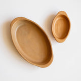 Two Mexican terracotta ceramic bowls on a white background