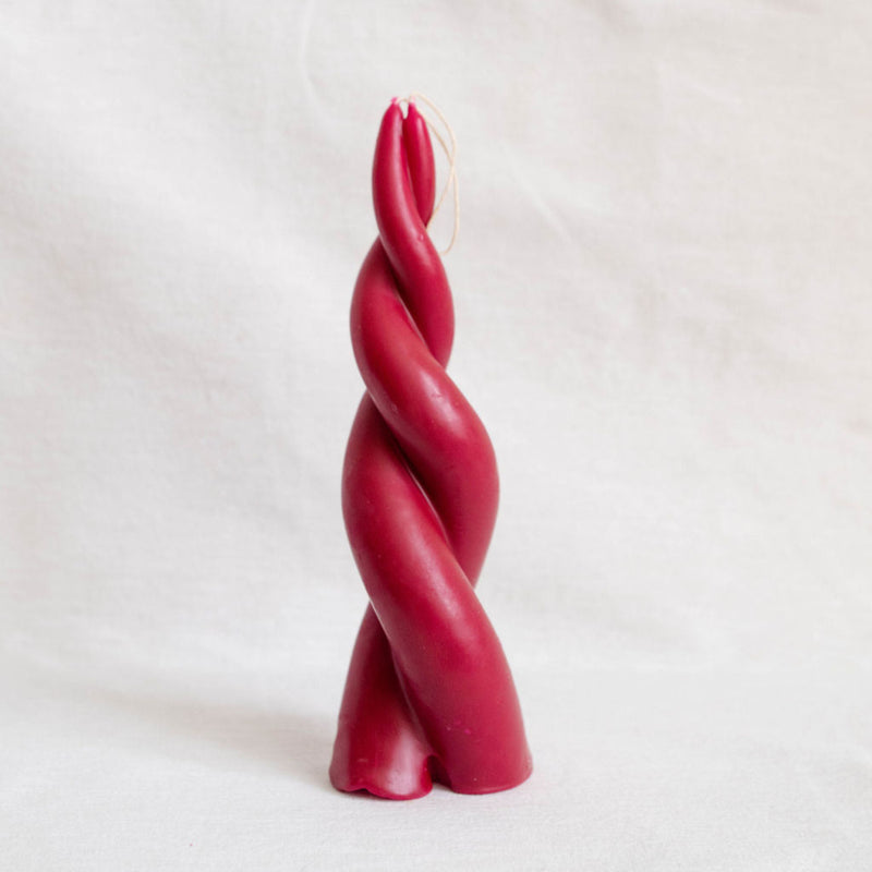 Artisanal Oaxacan double spiral twisted beeswax taper candle in Rosa Mexicano pink (Fuschia)