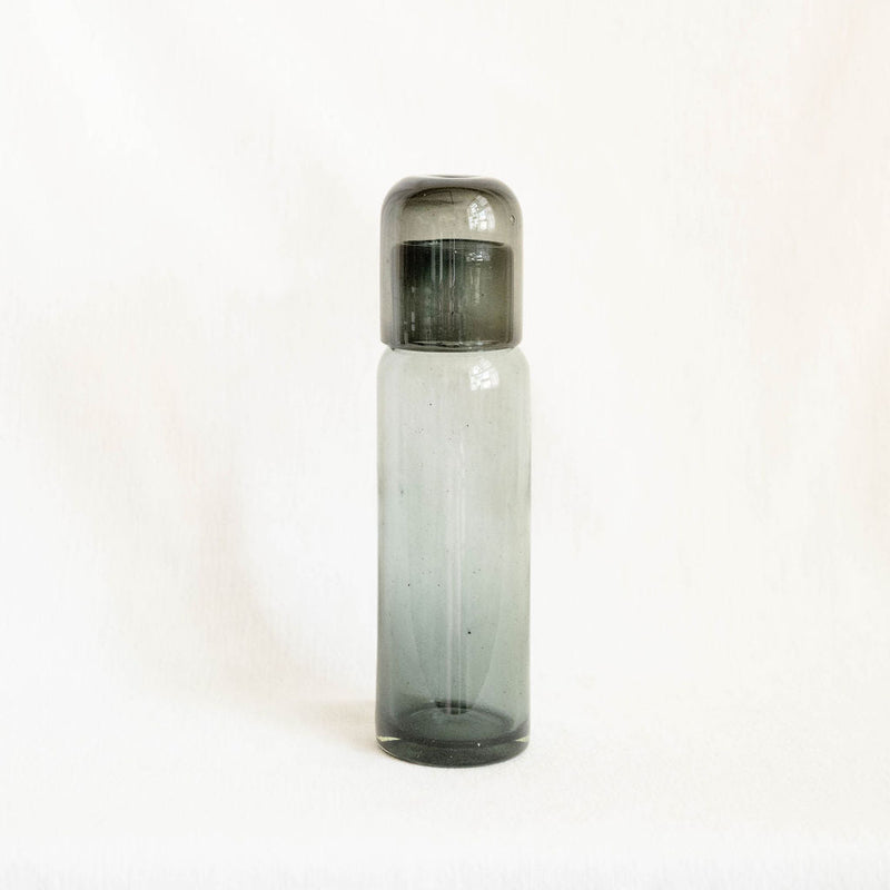 Handblown Glass Bedside Carafe in Black Smoke Clear with a lid that acts as a cup