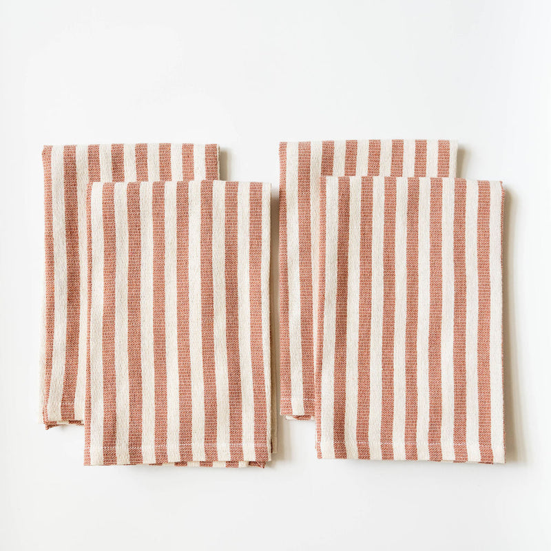 Set of 4 Stripednapkins with cinnamon brown and white pattern on a white background