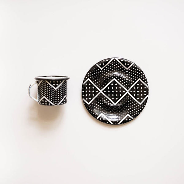 Black and white patterned expresso mug and plate on a white background