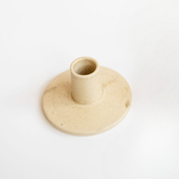 beige and brown ceramic candle holder