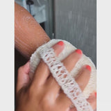 Agave body sponge lathering with soap in shower used to cleanse body