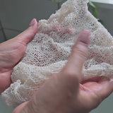 Video showing an ayate washcloth lathering, exfoliating and cleansing hands in shower.