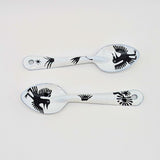set of two bird-like creatures (nahual) with long beaks and distinctive features on the enamelware peltre metal spoon