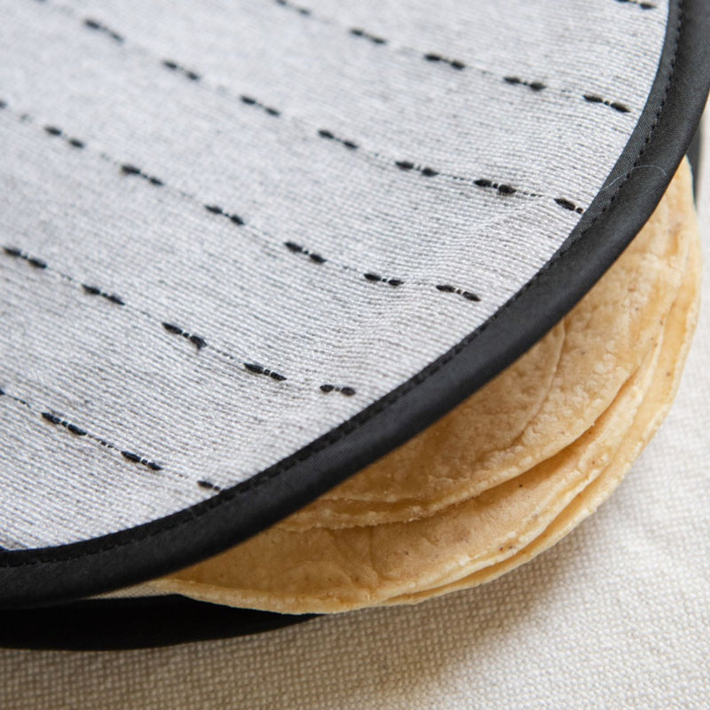 handwoven cotton tortilla warmer with corn tortillas peeking out