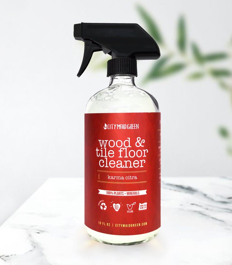 City Maid Green Refillable Natural Vegan Non-Toxic Wood & Tile Cleaner. A natural, refillable,  non-toxic floor cleaner that gets down and dirty (so you don’t have to). City Maid Green’s Wood and Tile Cleaner is made entirely of plants and minerals that are tough on dirt and grime but are safe for you, your family, and your home.  City Maid Green natural cleaning at VOLVERde.  Citrus scent. Glass spray bottle. Reduce, reuse and refill!