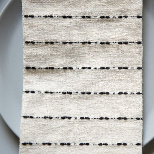 Handwoven by a family of pedal loom weavers in Teotitlán del Valle, Oaxaca using ancestral techniques passed down by generations. These 100% Mexican cotton napkins get softer and more absorbent with every wash. Their modern design makes ditching paper towel waste and opting for this sustainable, zero-waste alternative a no-brainer. Woven to heirloom quality, making the perfect housewarming gift. Bonus: each purchase supports indigenous artisans in Mexico and keeps our ancestral traditions alive.