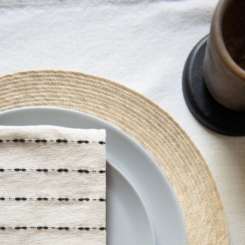 Handwoven by a family of pedal loom weavers in Teotitlán del Valle, Oaxaca using ancestral techniques passed down by generations. These 100% Mexican cotton napkins get softer and more absorbent with every wash. Their modern design makes ditching paper towel waste and opting for this sustainable, zero-waste alternative a no-brainer. Woven to heirloom quality, making the perfect housewarming gift. Bonus: each purchase supports indigenous artisans in Mexico and keeps our ancestral traditions alive.