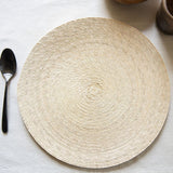 Sustainable Natural Palm Placemat Round on a white tablecloth 