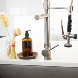 sink with 16 oz glass bottle hand soap dispenser for zero waste dish soap refills next to agave fiber dish brush