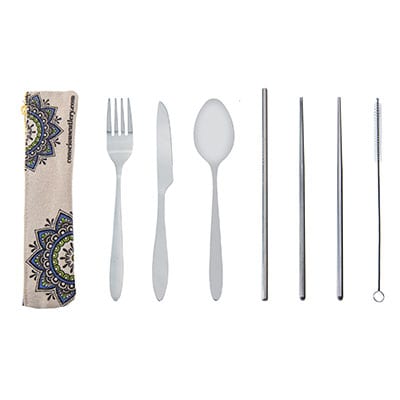 Close-up stainless steel 7-piece cutlery set and storage pouch with Mandala design